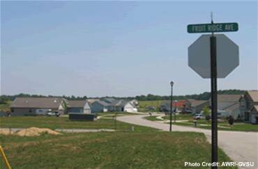 A housing development showing the street sign "Fruit Ridge Ave".